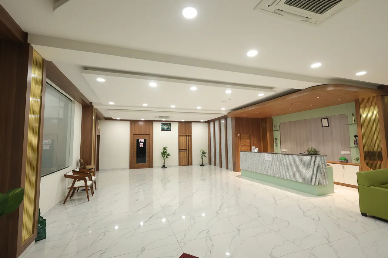 Reception lobby with a marble floor at Sree Raaga Resorts