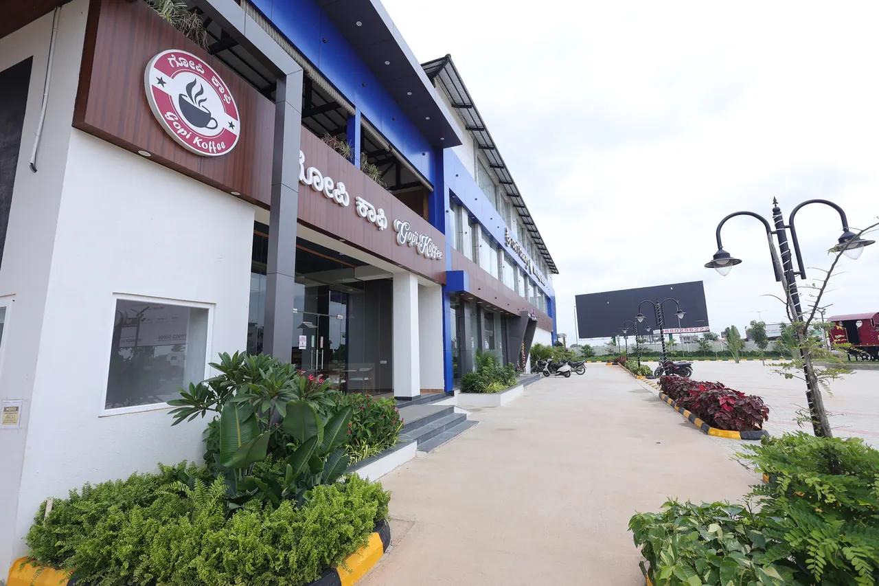 Gopi Coffee storefront and walkway on the restaurant block