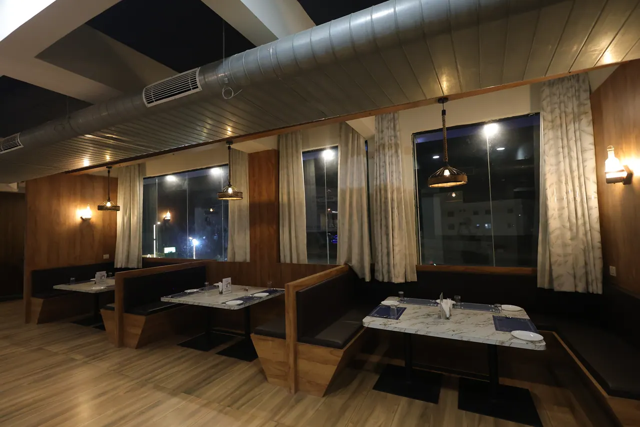 Interior of the Muraaya fine dine restaurant with booth seating