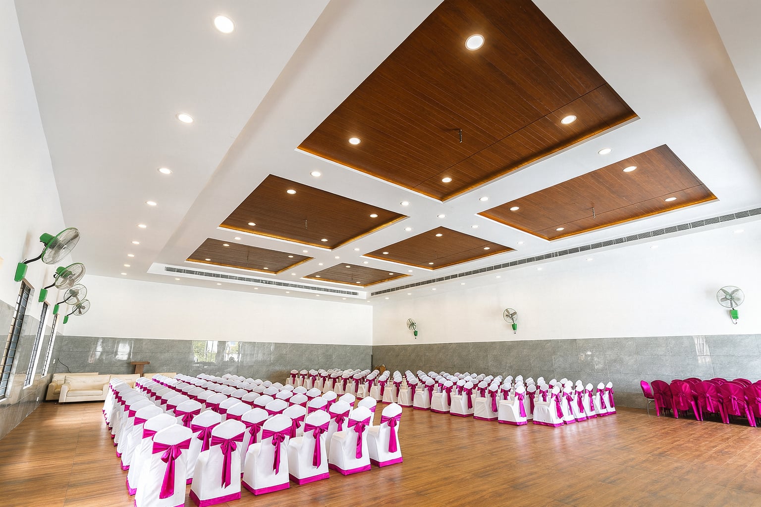 The grand banquet hall set for a wedding reception