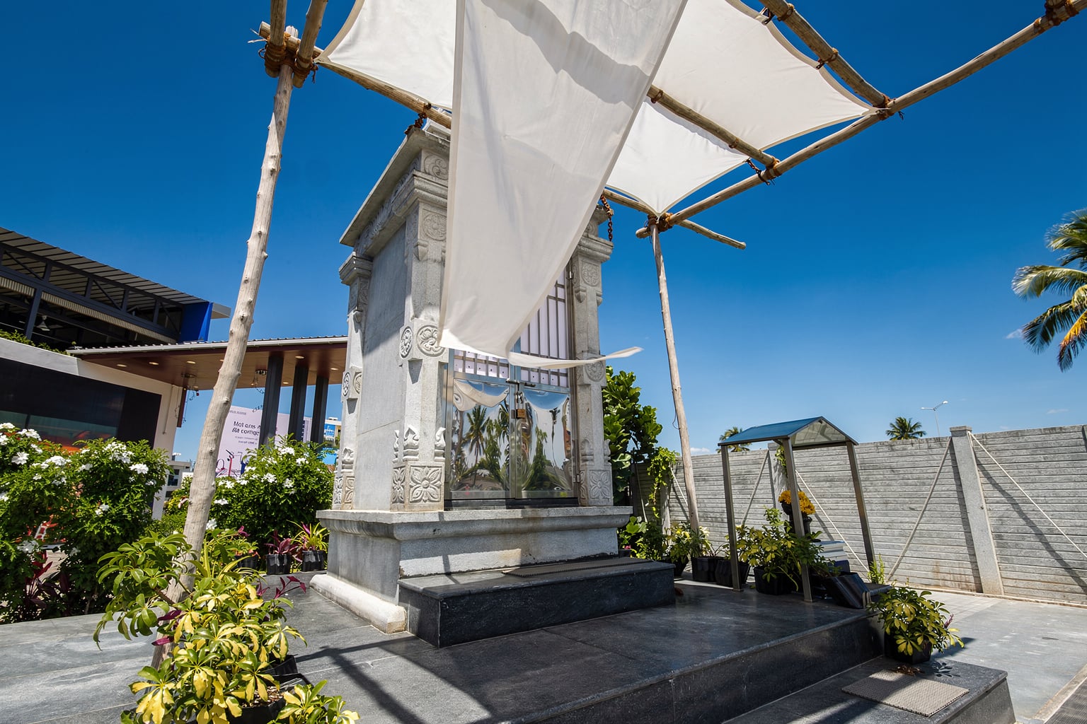 The stone shrine in the grounds at Sree Raaga Resorts